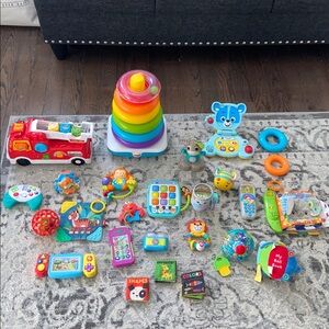$275 LEAP FROG V TECH FISHER PRICE BUNDLE TOY LOT FOR TODDLERS FIRE TRUCK BOOKS